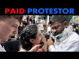 Nate Friedman investigates pro-Iran NYC protests post-US strikes. Alleges  "professional protestors" like David Chung & Manolo Santos (The People's  Forum) blocked interviews, linking them to ...