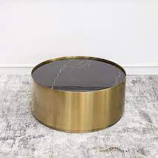 Marc Black Marble Gold Coffee Table Round Drum Base Finn Avenue Here, you can find stylish gold coffee tables that cost less than you thought possible.