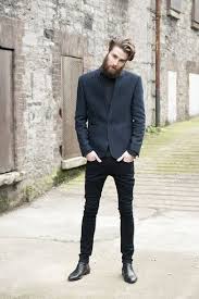 Dress In A Charcoal Sportcoat And Black Slim Jeans For A Dapper Casual Get Up Black Leather Chelsea Boot Black Skinny Jeans Men Mens Outfits Black Biker Jeans