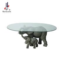 The table design concept, proposes an interpretation of the largest of the animals, the elephant. Resin Elephant Family Glass Coffee Table Buy Elephant Coffee Table Elephant Table Coffee Table Product On Alibaba Com