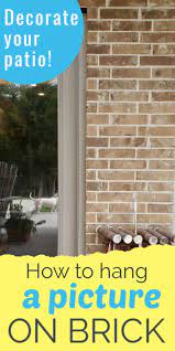 Learn How To Hang Pictures On Brick Wall Easily With This Step By Step Tutorial Haning Pictures On Brick Is Easy Wi Hanging Pictures French Home Decor Outdoor