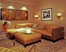 فى غرفة المعيشة ممكن نستخدم الكنب و الفوتيهات او الكراسي اللى ظهرها قصير لانها تعطى احساس ب Sconces Living Room Wall Decor Living Room Wall Sconces Living Room