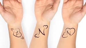 Simple and very beautiful mehndi design for girls and women. N Name Mehndi Design Images