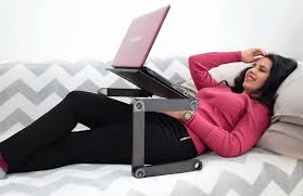 There's a strap, which allows you to securely fasten your laptop to the desk; Use Laptop While Lie Down Get Mine Easy Laptop Desk Facebook