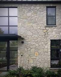Primarily light grey in color and gold, this natural quartzite stone panel is used to create beautiful design features including accent walls, fireplace walls, and for exterior projects including cladding of structures and architectural elements including. Modern Rustic Industrial Stone Home Outdoor Fireplace Stone Veneer Exterior Stone Cladding Exterior Stone Veneer Exterior Exterior Stone