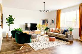A sofa facing away from the dining room defines the conversation area from the rest of this open layout. Simple Decorating Rules For Arranging Furniture My Decorative