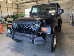 Image result for Brilliant Black 2003 Jeep