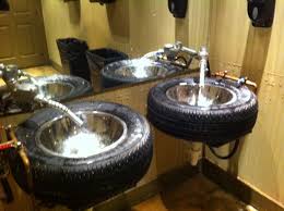 A Good Idea For Car Lovers This Is In The Men S Room At Ford S Garage Restaurant In Ft Myers Fl Garage Transformation Garage Design Man Cave Garage