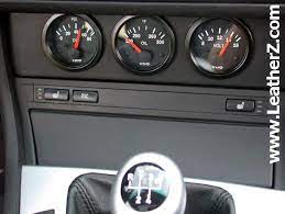 This gauge pod system easily attaches to your factory upper steering column cover. E46 Gauge Panel Leatherz