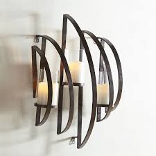 Wayfair shop for a decorative candle holder. Our Handcrafted Hand Painted Wrought Iron Zander Sconce Has A Contemporary Zigzag Vibe Which Offers A Tasteful Co Metal Wall Light Metal Wall Sconce Sconces