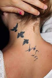 25 Simple Tattoo Designs Simple Neck Tattoos Neck Tattoo Bird Tattoos For Women