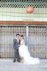 If takes a few seconds to download any background from our site. Asian Couple With Pre Wedding Scene Out Door Background Stock Photo Picture And Royalty Free Image Image 13371808