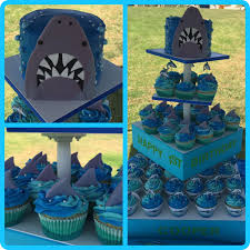 Baby Shark Cupcake Cake 1st Birthday Shark Themed 1st Birthday Cupcakes And Smash Cake Shark Cupcakes Shark Cake Cake C Kids Themed Birthday Parties Beach Birthday Party Shark Birthday Party