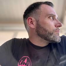 The gorilla “had taken a running start, jumped and launched into the  glass," a zoo visitor said.