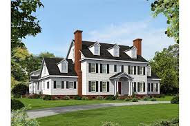 Storage units and three garage bays with a wrap around driveway for safe entry/ exit. A Guide To 5 Essential New England Architectural House Styles