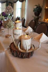 Rustic Wedding Table Decorations Birch Tree Candles And Antlers With Tall Floral Centerpiec Rustic Wedding Table Decor Rustic Wedding Table Birch Tree Candles
