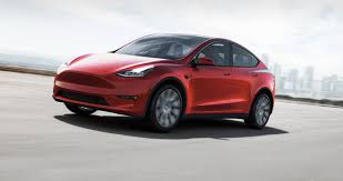 Der innenraum des model y ist einfach und aufgeräumt. 2021 Tesla Model Y Review Pricing And Specs