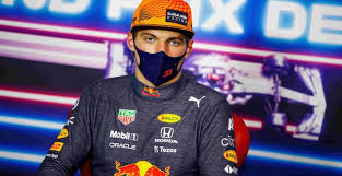 Verstappen passes hamilton around the outside, but has to make a large correction for oversteer as he runs off the track. Nl4qosq8qatgcm