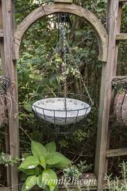 Bird Bath Feeder With Solar Light And Planter Easy Ways To Add Water To Your Garden Gardening From House To Home Diy Water Feature Upcycle Garden Diy Bird Bath