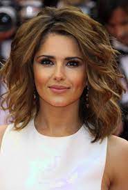We love the short, tapered sides and voluminous top. Short Hairstyles For Thick Wavy Hair Female Folade