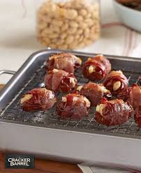 Dattes Fourrees Au Feta Et Aux Amandes Enrobees De Bacon Qu Est Ce Qui Mijote De Kraft Recipe Kraft Recipes Food Bacon Wrapped