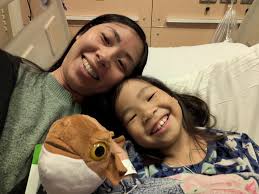 Gary just called. They had her standing yesterday! Heart biopsy from  yesterday is good which means she isn't rejecting it. Dialysis is off! She  asked who Gary was talking to. She received