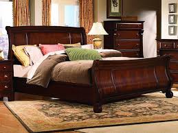 Showcase Of Bedroom Designs With Sleigh Beds A traditional style sleigh bed in black finish that became the focal point of this bedroom. showcase of bedroom designs with sleigh