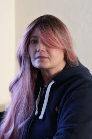 My wife. 60yr old and still stunning. Canon r50. No filters