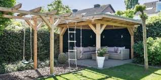 Beautiful Covered Garden Seating Area Cave And Climbing Frame For Children In 2021 Gartensitzplatz Gartenspielhaus Garten
