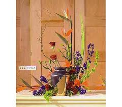 Some areas are shut down with no delivery service available. Bird Of Paradise Cremation Urn Sympathy Arrangement In Woodstock On Smith S Flowers