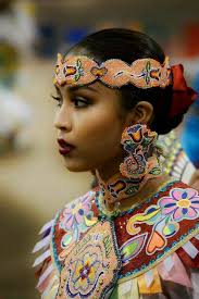 Native American pow wow colorful dress and headpieces