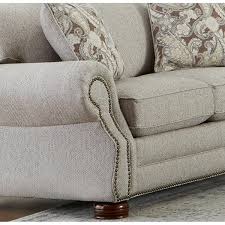 This is a traditional sofa back that is shaped much like a camel's hump, raised in the middle. Made In Usa Austin Taupe Fabric Sofa And Chair With Nailhead Trim On Sale Overstock 27415150