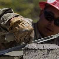 Malaysian Army Cpl. Linggie Bin Sengli chips extra