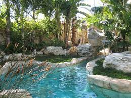 The beach is nice sand and great to relax at with. Rock Pool With Lazy River Tropical Garden Style Kolonialstil Garten Los Angeles Von My Garden Landscape Design By Wayne Houzz