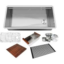 Here, both the kitchen sink and the countertop are made from the same material, creating a smooth transition for a clean, seamless look. Stainless Steel All In One Workstation 36 In 16 Gauge Undermount Single Bowl Kitchen Sink W Build In Ledge And Accessories Overstock 29303070