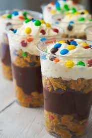 These creepy crawly dirt cup pudding parfaits feature alternating layers of crushed chocolate sandwich cookies & rich chocolate pudding. Monster Cookie Pudding Parfaits Are A Fun And Easy No Bake Dessert Perfect For Summer These Colourful Desser Mini Dessert Cups Yummy Food Dessert Kid Desserts