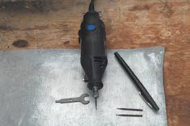 How To Engrave Metal With A Dremel Tool Ehow Dremel Tool Dremel Tool Projects Dremel Carving
