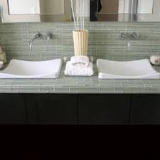 Brass tapware, geometric cement tiles, rendered concrete wall. 16 Tile Bathroom Countertop Ideas Tile Bathroom Bathroom Countertop Tile Countertops