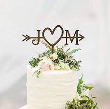 A simple plywood heart bedecked with your initials makes for the final romantic touch to your dessert. Amazon Com Rustic Wedding Arrow Cake Topper Decoration Beach Wedding Bridal Shower Initials Cake Topper Rustic Country Chic Wedding Top Handmade