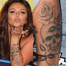 Jesy nelson recently got a new tattoo of a gun credit: Jesy Nelson S Tattoos Meanings Steal Her Style