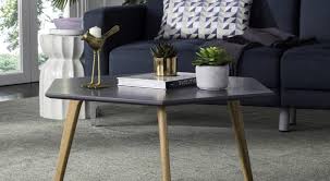 Gold barrel table with glass top // 08: 15 Stylish Coffee Tables That Won T Break The Bank Brit Co