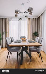 It?s the place where people come together to share meals and celebrations with family and friends. Dining Room Wooden Image Photo Free Trial Bigstock