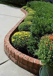 Often overlooked, lawn and flower bed edging can play an important role in your landscape design plan to improve your property's overall curb appeal.edging comes down to simply separating two distinct areas. 25 Beautiful Brick Flower Bed Ideas For Front Yard Landscaping Freshouz Com Brick Garden Brick Garden Edging Front Yard Landscaping