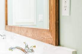 Do you assume wood framed bathroom mirrors seems to be great? How To Diy Upgrade Your Bathroom Mirror With A Stained Wood Frame Building Our Rez