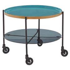 To keep the story short here are the ingredients. Round Metal Wheeled Coffee Table With Enamel Tray Top Black Olivia May Target