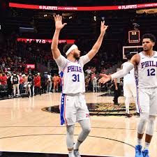 Trae young #11 of the atlanta hawks drives against joel embiid #21 of the philadelphia 76ers during the first half of game 6 of the eastern conference semifinals at state farm. Clqi Cmjrmjmom