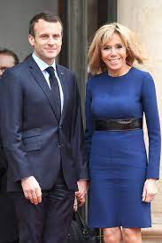 Among the french eager to enjoy their newfound freedom was president emmanuel macron's wife, 68, who donned a vibrant red suit to open the francois pinault collection at the bourse de commerce de. Brigitte Macron France S First Lady Is Her Husband S Equilibrium Abc News