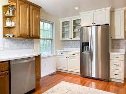 When we moved into our vintage house nearly twenty years ago, there was still a 1930's era kitchen intact, untouched by modern decor and it's cabinets and woodwork were white. Wall Colors For Honey Oak Cabinets Love Remodeled