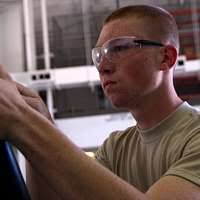U.S. Army Spc. Justin Minas, vertical engineer, with