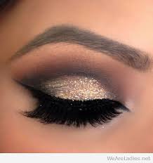 silver glitter eye makeup and black dels